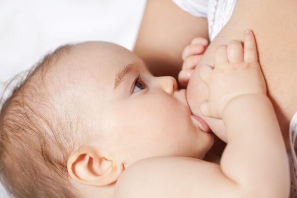 Baby being breastfed
