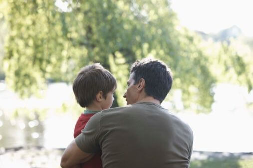 Father and son in a park
