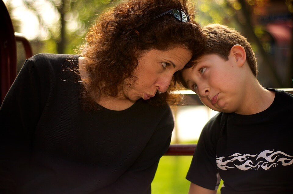 Mom and boy sulking