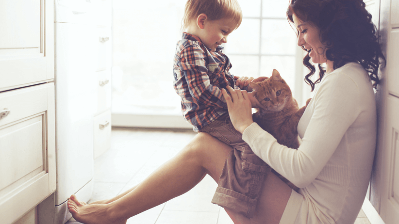 Mom holding son