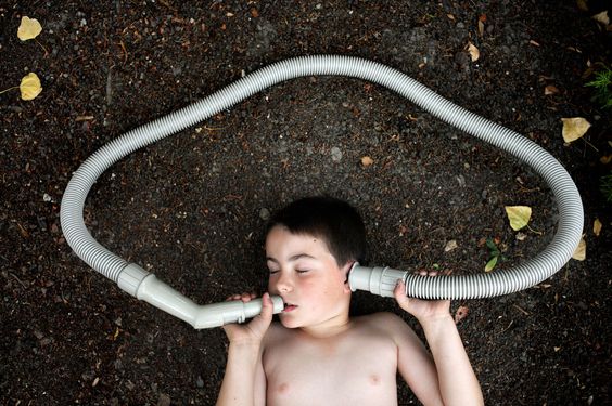 Boy lying on the ground