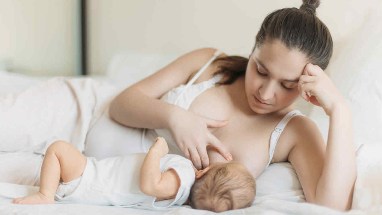 Mom breastfeeding her child