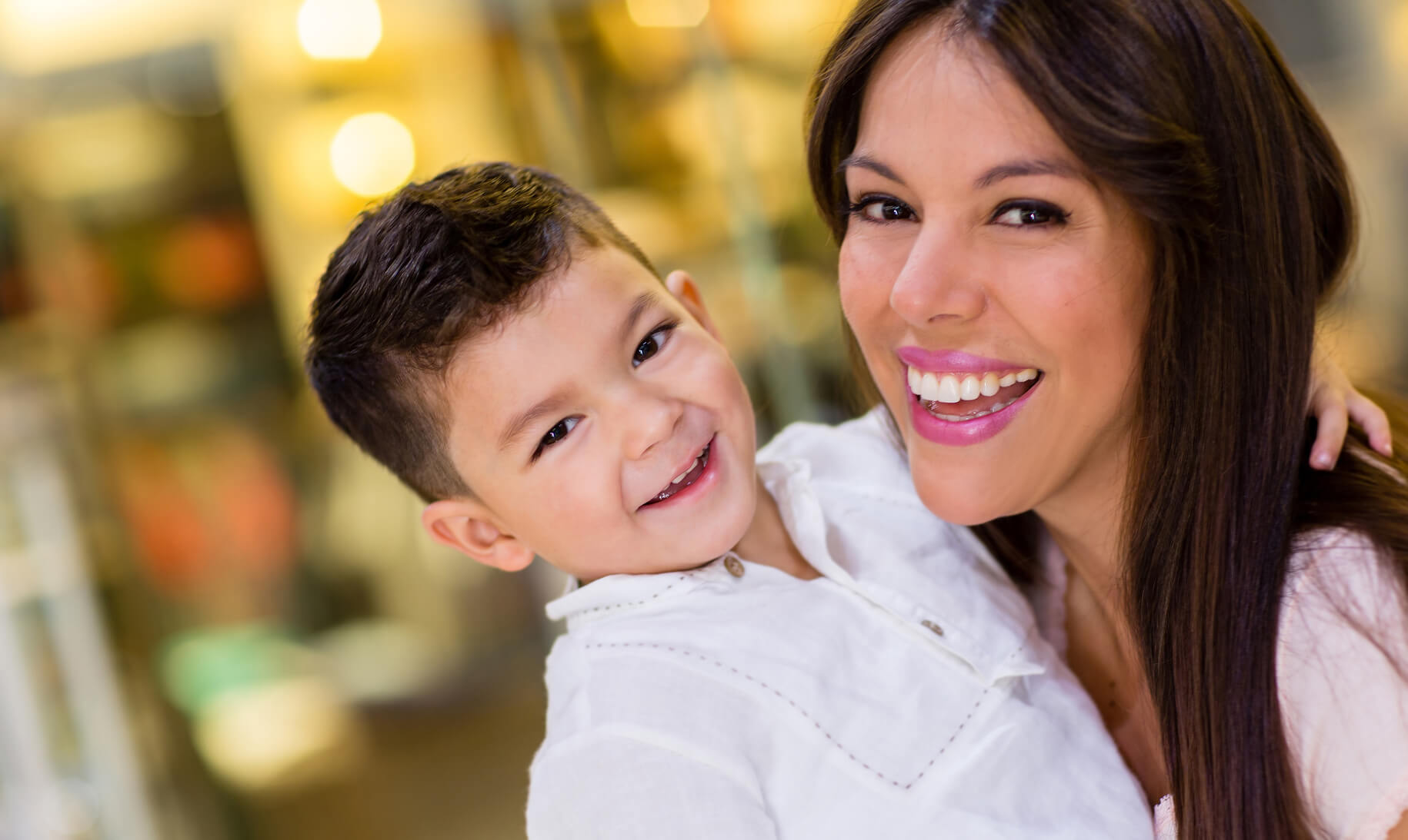 Mom and son smiling