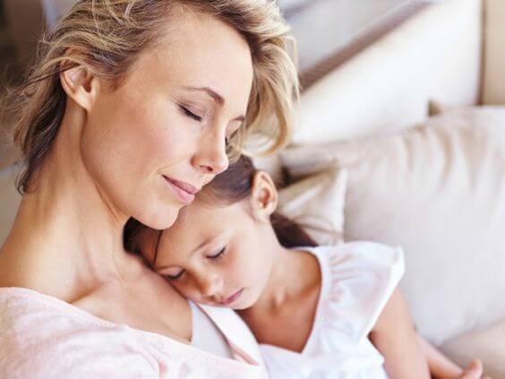 mom and girl getting rest