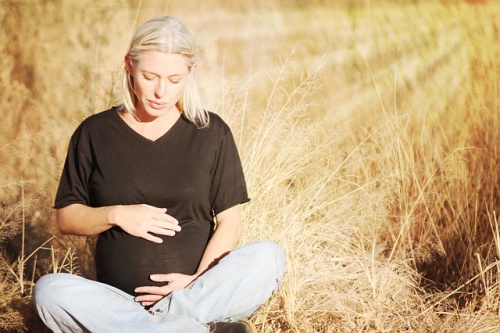 Pregnant woman contemplating giving birth