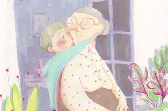 boy kissing grandmother