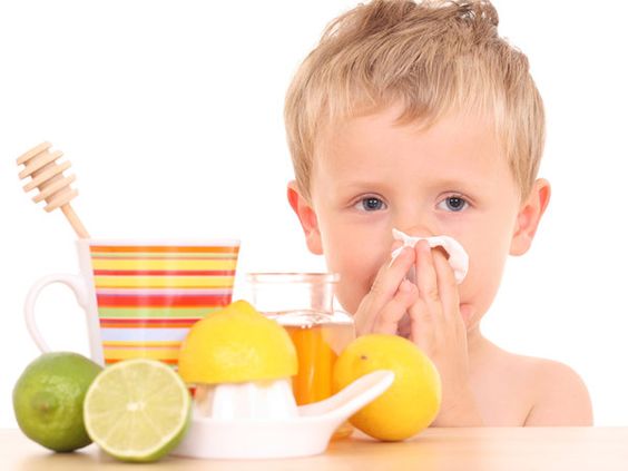 boy increasing his immune system with vitamin C