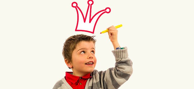 boy with a crown drawn on top of his head