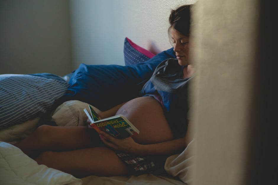 pregnant woman reading