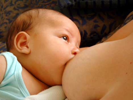 baby breastfeeding to sleep through the night