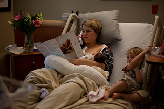 woman who just had a c-section in the hospital with babies