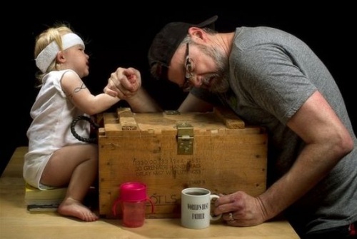 father and daughter playing together