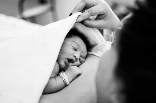 don't hold a newborn baby before their mother has
