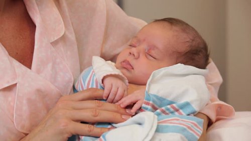 don't hold a newborn baby before their mother has