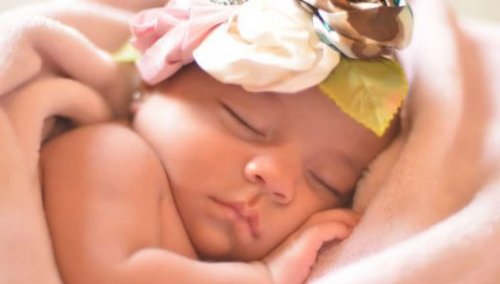 a sleeping newborn baby