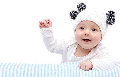 newborn baby smiling
