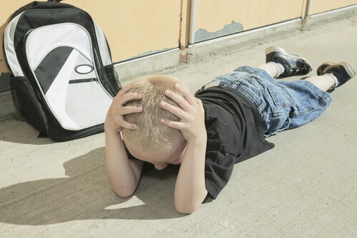 A child's headaches can be caused by stress in school.