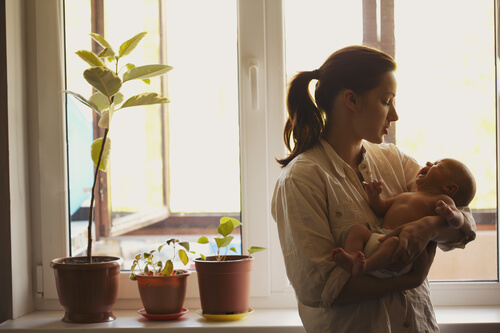 mother holding her baby