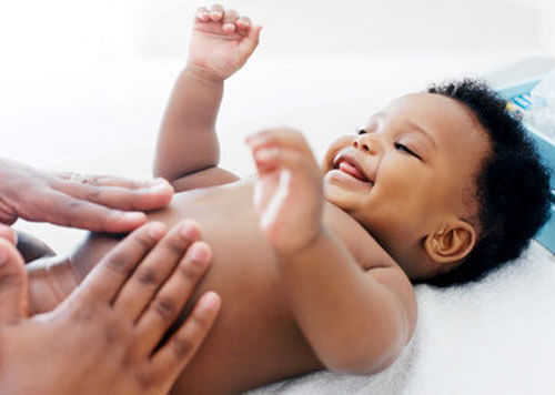 tickling and kissing your baby's belly
