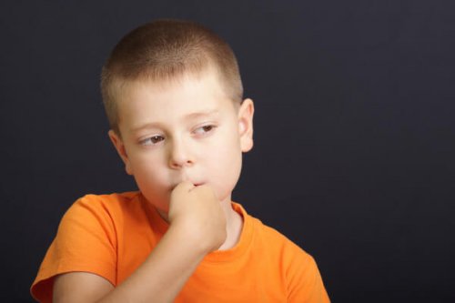 a boy sucking his thumb