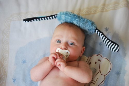 baby using a pacifier