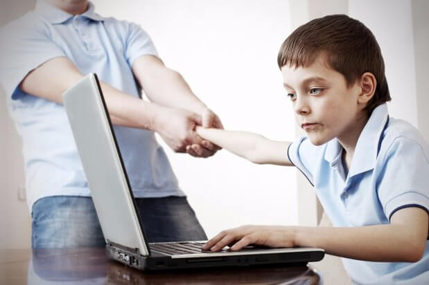 boy addicted to computer