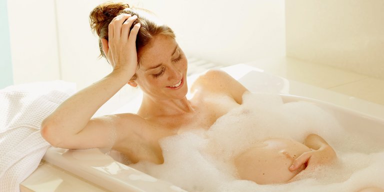 Pregnant woman in bathtub