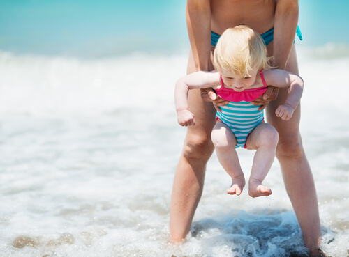 Child getting a dip