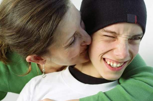 Mother teaching teenager about willpower