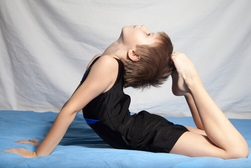 Boy doing artistic gymnastics