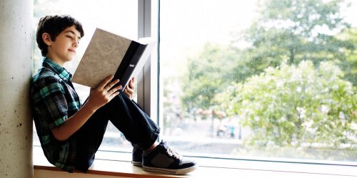 Child reading a book