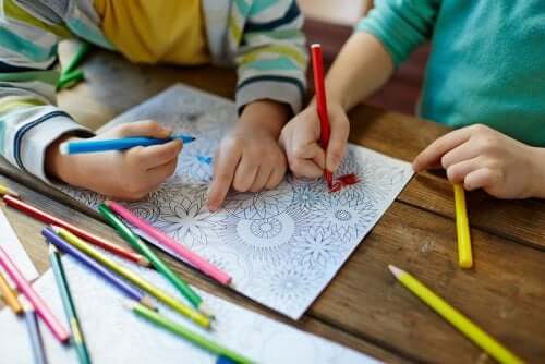 Children coloring mandalas.