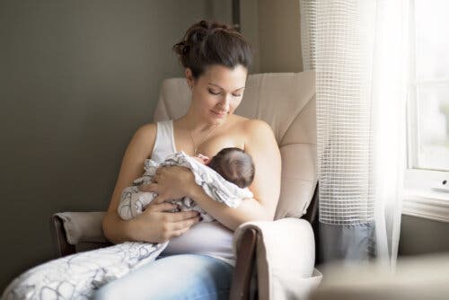 A mother breastfeeding her baby.