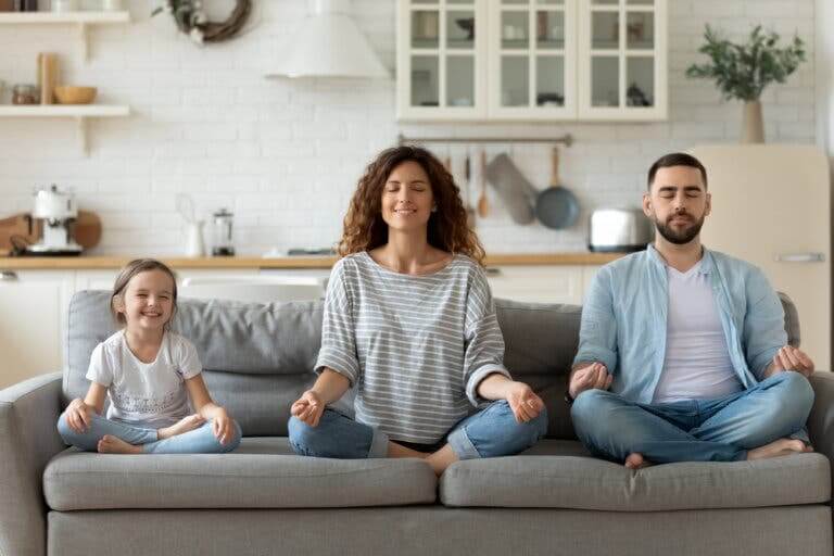 A family meditating.