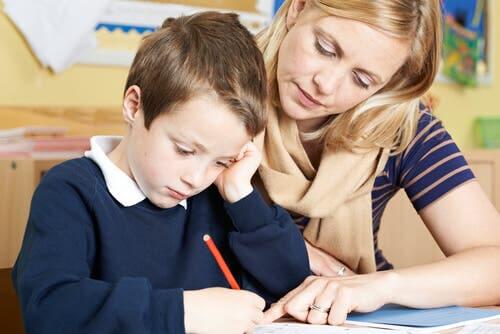 A teacher explaining something to a student.