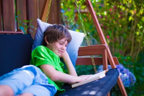 A teen reading personalized story books.
