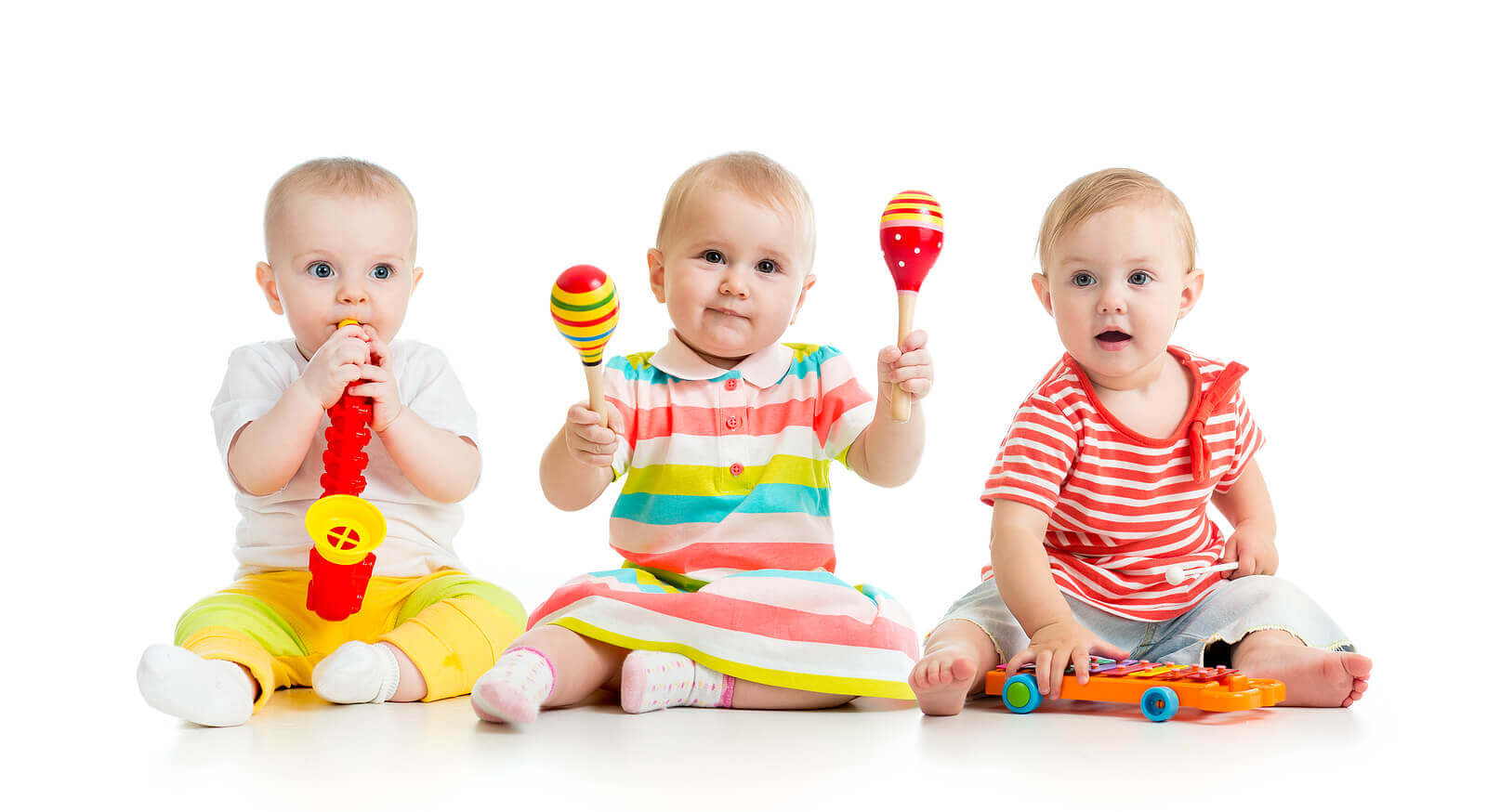 Babies playing musical instruments.