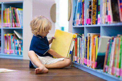 A young boy reading a book.