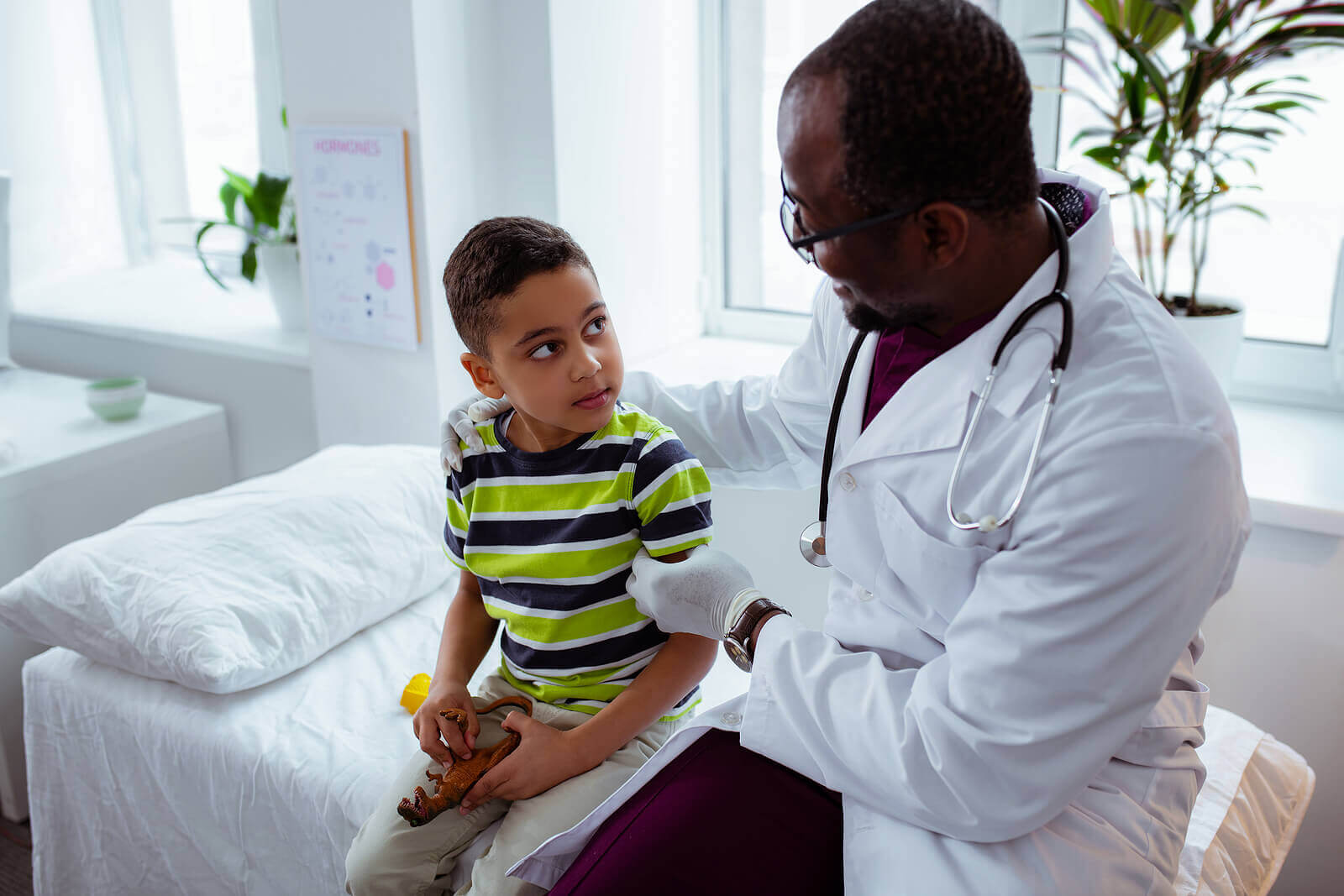 Child with pediatrician.