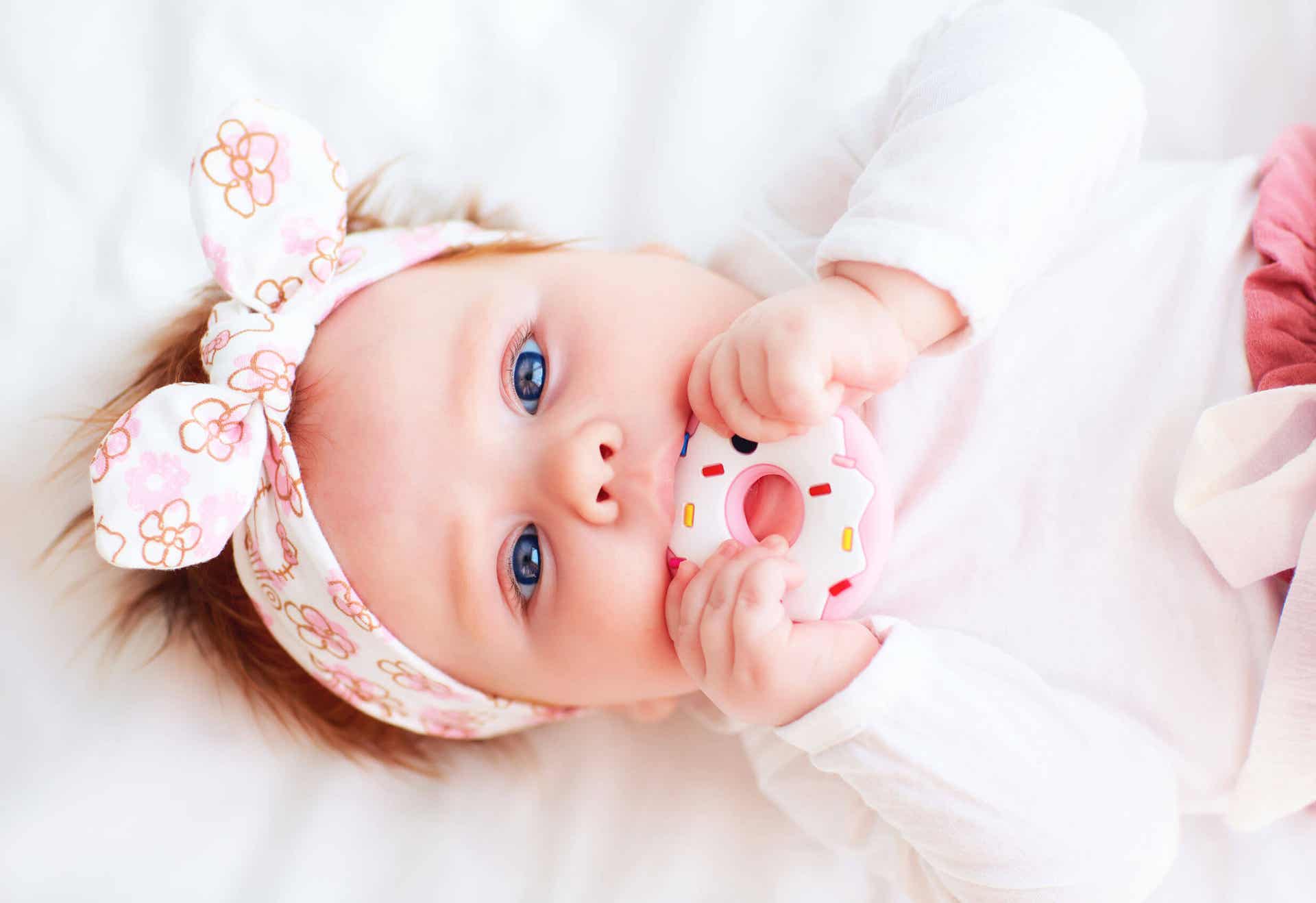Baby with teether.