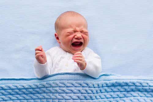 A crying newborn.