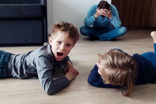 A father feeling frustrated because his children won't obey. Three to six-year-olds