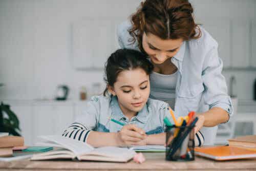 A mother helping her daughter study.