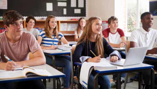 Highschool students paying attention in class.