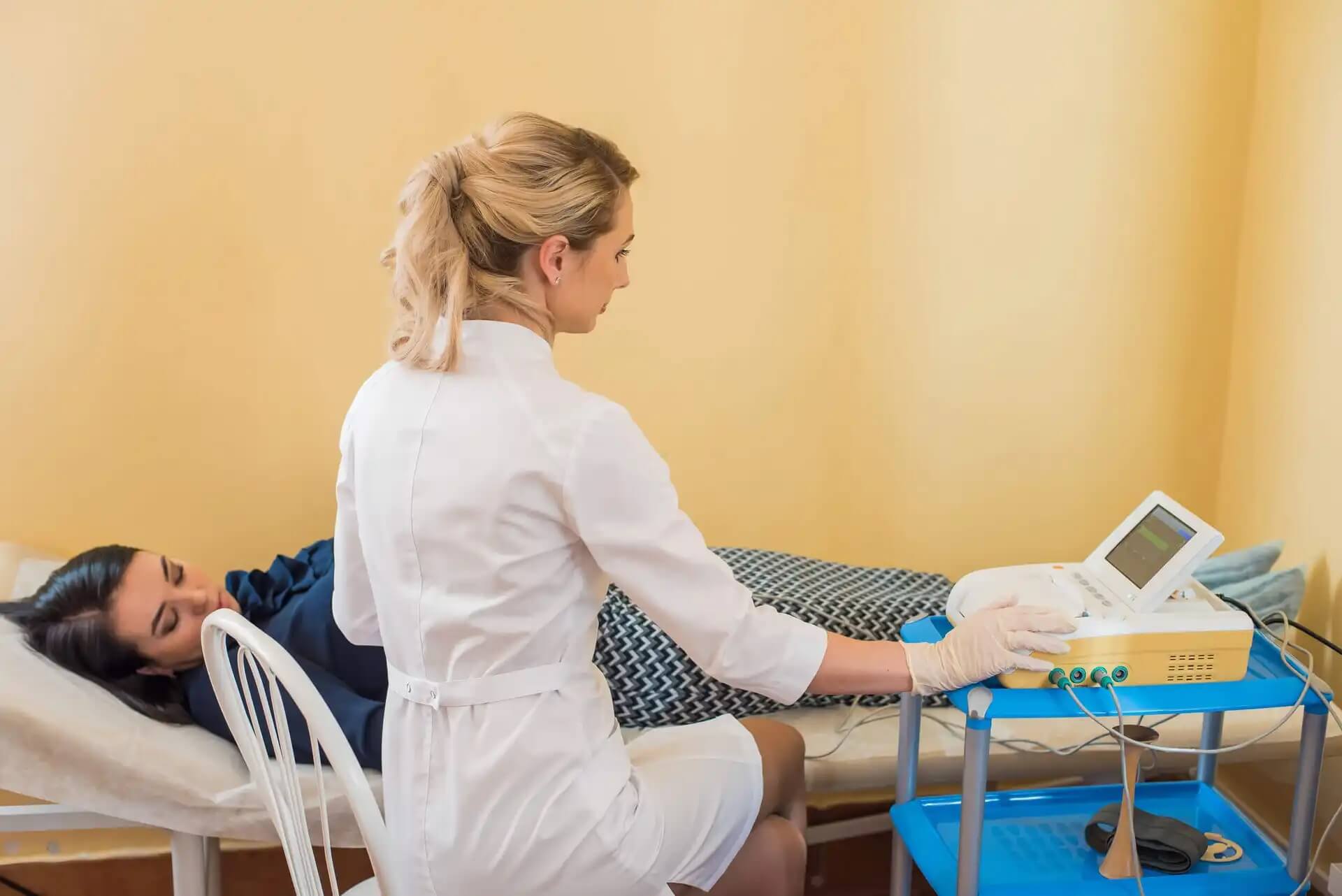 A check up for a pregnant lady.