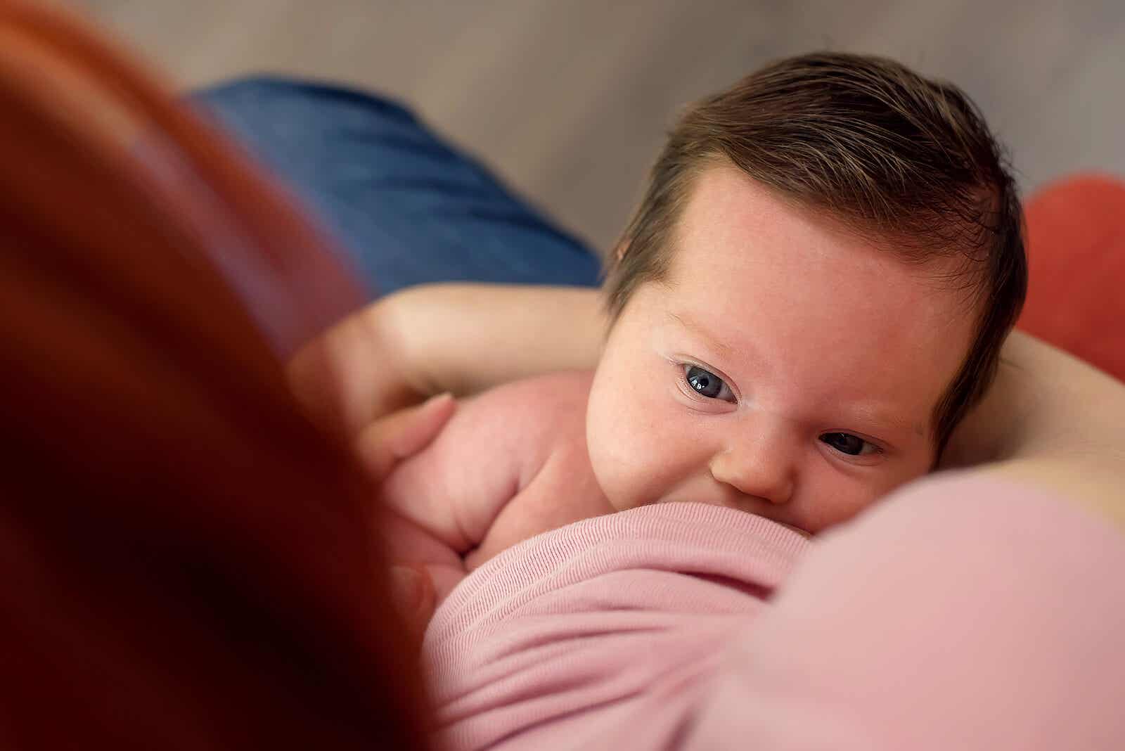 Baby drinking breastmilk.