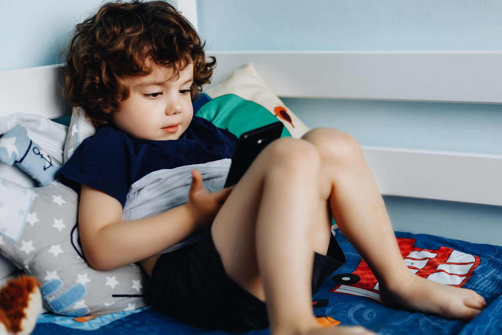 Kid with a cell phone.