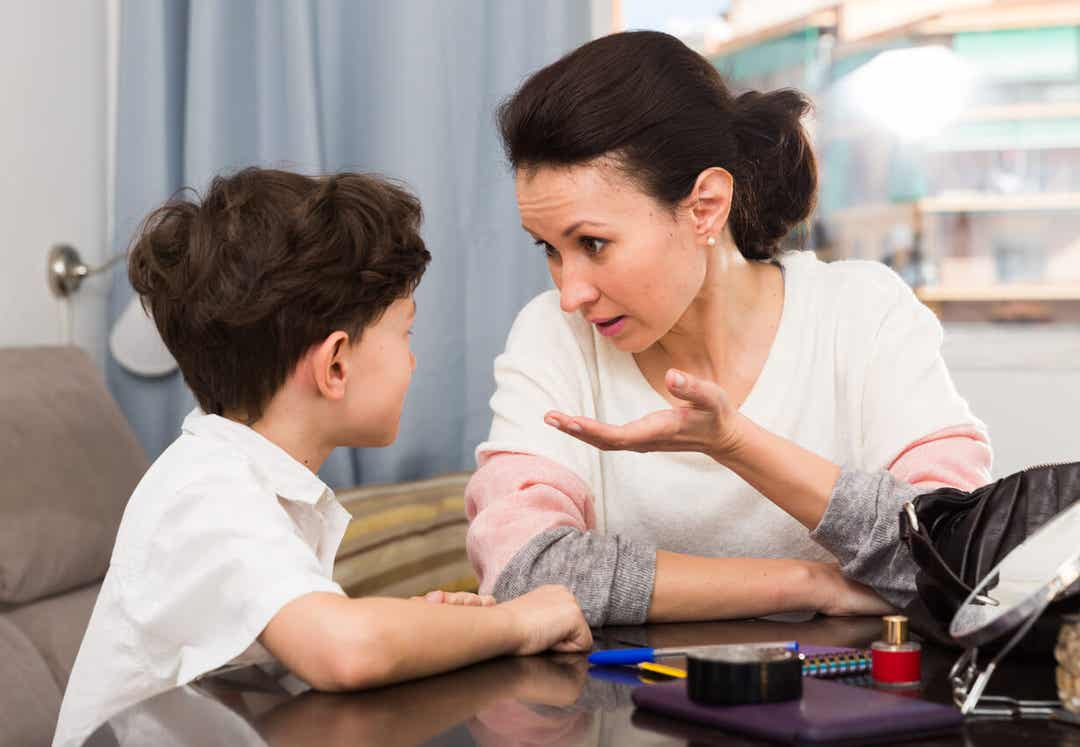 A mother explaining something to her young son.