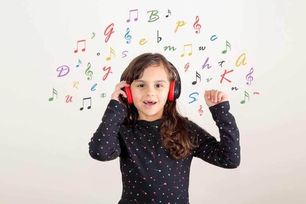 Girl listening to children's songs in English to learn the language.
