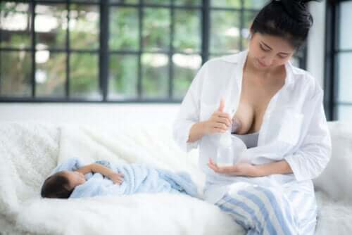 Premium Photo  Young woman expresses breast milk with a manual